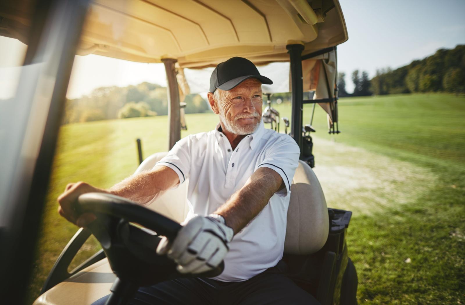 a senior in gold cart